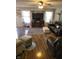 Spacious living room with hardwood floors, comfortable seating, and a cozy entertainment area at 5912 Accent Dr, Indianapolis, IN 46221