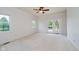Spacious bedroom featuring neutral carpet, bright light, and access to the exterior at 6345 Canak Dr, Avon, IN 46123