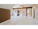 Bonus room featuring a built-in media center and ample storage space with neutral carpeting at 6345 Canak Dr, Avon, IN 46123