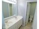Bathroom with double sinks and a separate toilet room at 7150 Pheasant Ridge Dr, Indianapolis, IN 46237