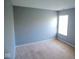 Bedroom with neutral walls and carpet has natural light at 7150 Pheasant Ridge Dr, Indianapolis, IN 46237