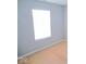 Sunlit bedroom features tan carpeting and a window at 7150 Pheasant Ridge Dr, Indianapolis, IN 46237