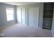Bedroom with carpet, large closets and storage at 7150 Pheasant Ridge Dr, Indianapolis, IN 46237