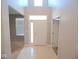 Bright and welcoming foyer with neutral walls, tiled flooring, and ample natural light, creating a pleasant entrance at 7150 Pheasant Ridge Dr, Indianapolis, IN 46237