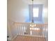 Hallway with natural light, a chandelier and a view of the front door at 7150 Pheasant Ridge Dr, Indianapolis, IN 46237