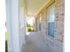 Spacious front porch with brick accents, white columns, and a bright, open feel, perfect for relaxing at 7150 Pheasant Ridge Dr, Indianapolis, IN 46237