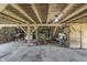 Barn interior with concrete flooring and exposed wood beam construction at 7371 E 100 N, Whitestown, IN 46075