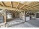 Barn interior showing concrete flooring and exposed beam architecture at 7371 E 100 N, Whitestown, IN 46075