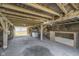 Interior of barn with concrete floor and exposed wood beams and siding at 7371 E 100 N, Whitestown, IN 46075