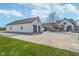 Stately home with a detached garage, expansive driveway, and well-maintained lawn at 7371 E 100 N, Whitestown, IN 46075