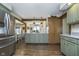 Spacious kitchen featuring stainless appliances, light countertops, and shaker style cabinets at 7371 E 100 N, Whitestown, IN 46075