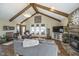 Spacious living room with vaulted ceiling and stone fireplace at 7371 E 100 N, Whitestown, IN 46075