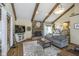 Bright living room with stone fireplace and seamless open floor plan at 7371 E 100 N, Whitestown, IN 46075