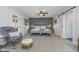 Large main bedroom features a king bed, two nightstands, and barn door at 7371 E 100 N, Whitestown, IN 46075