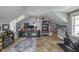 Spacious office space with a desk, shelving, and exercise equipment at 7371 E 100 N, Whitestown, IN 46075