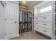 Custom walk-in closet with built-in shelves, drawers, and ample storage space at 7371 E 100 N, Whitestown, IN 46075