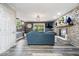 Spacious living room featuring a stone fireplace, sliding glass doors, and sleek gray walls for a modern touch at 7440 Graham Rd, Indianapolis, IN 46250
