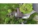 An aerial view of the property showing the outdoor seating area and a camper in the driveway at 8035 Black Oak Ct, Plainfield, IN 46168