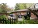 A brick home has a concrete patio with outdoor furniture and a grill at 8035 Black Oak Ct, Plainfield, IN 46168