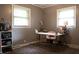 Bright office space with a modern desk, soft pink chair, and plenty of natural light at 8035 Black Oak Ct, Plainfield, IN 46168