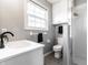 Bright bathroom with a white vanity, black faucet, and modern fixtures at 8142 Bittern Ln, Indianapolis, IN 46256