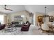 Comfortable living room features vaulted ceilings, plush seating, and stylish decor at 8410 Glenwillow Ln # 208, Indianapolis, IN 46278