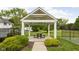 Covered picnic area with table offers residents pleasant outdoor seating for gatherings at 8410 Glenwillow Ln # 208, Indianapolis, IN 46278
