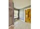 This spacious bathroom features tile floors and a walk-in closet entryway at 8830 Kipling Dr, Indianapolis, IN 46239