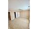 Spacious bedroom with neutral carpet, closet, and natural light at 8830 Kipling Dr, Indianapolis, IN 46239