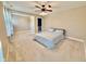 Bedroom with a ceiling fan and carpet, creating a comfortable and inviting space at 8830 Kipling Dr, Indianapolis, IN 46239