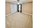 Bedroom with neutral walls, plush carpet, window, and closet at 8830 Kipling Dr, Indianapolis, IN 46239