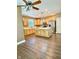 Spacious kitchen with wood cabinets, a kitchen island, and stainless steel appliances at 8830 Kipling Dr, Indianapolis, IN 46239