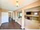 Spacious living room featuring a cozy fireplace and neutral carpeting at 8830 Kipling Dr, Indianapolis, IN 46239