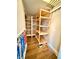 Walk-in pantry with wooden shelves at 8830 Kipling Dr, Indianapolis, IN 46239