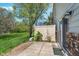 Back patio featuring green space, a privacy fence and mature landscaping at 9162 Cinnebar Dr, Indianapolis, IN 46268
