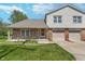 Charming two-story townhome featuring brick and siding exterior with an attached two-car garage at 9162 Cinnebar Dr, Indianapolis, IN 46268