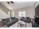 Comfortable living room with hardwood floors, stylish furniture, and a staircase to the second level at 9162 Cinnebar Dr, Indianapolis, IN 46268