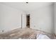 A bright bedroom offers open closet space and plenty of potential at 940 N Chester Ave, Indianapolis, IN 46201