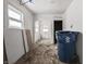 Open-concept living area offering renovation potential at 940 N Chester Ave, Indianapolis, IN 46201