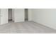 Spacious bedroom with plush carpeting and a closet, providing a peaceful retreat at 9734 Behner Dr, Fishers, IN 46250