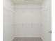 Walk-in closet features a full wall of wire shelving for optimal storage space at 9734 Behner Dr, Fishers, IN 46250