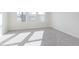 Bright bedroom featuring neutral carpet, three windows, and ample natural light at 9735 Behner Dr, Fishers, IN 46038