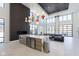 Lobby kitchen island with marble countertops, microwave and drink cooler at 9735 Behner Dr, Fishers, IN 46038
