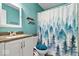Bathroom featuring a vanity and a shower curtain with a blue forest design at 1002 Prairie Depot, Indianapolis, IN 46241