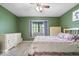 Bedroom featuring a large window with a window seat and ample closet space at 1002 Prairie Depot, Indianapolis, IN 46241