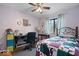 Comfortable bedroom with a vintage bed frame, study desk, and soothing lilac walls at 1002 Prairie Depot, Indianapolis, IN 46241