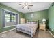 Spacious bedroom with large windows and carpeted floors, offering plenty of natural light at 1002 Prairie Depot, Indianapolis, IN 46241