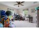 Bedroom with a ceiling fan, dual windows and carpet floors, ideal for a home office at 1040 Iowa St, Columbus, IN 47201
