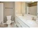 Bathroom featuring double sink vanity, tile floors, and bathtub shower at 10448 Pintail Ln, Indianapolis, IN 46239