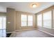 Bright bedroom featuring neutral carpet, natural light, and ample space at 10448 Pintail Ln, Indianapolis, IN 46239